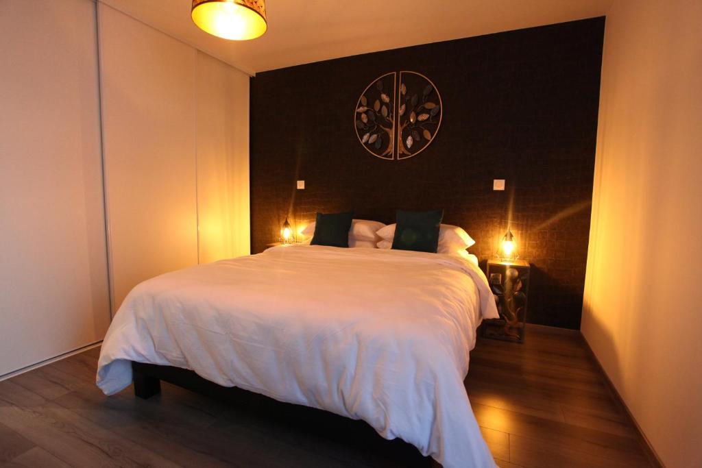 Katil atau katil-katil dalam bilik di Le Riesling Colmar All inclusive Free parking