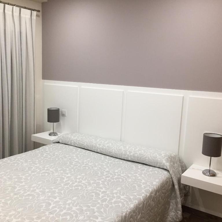 Posteľ alebo postele v izbe v ubytovaní Hostal Infantes