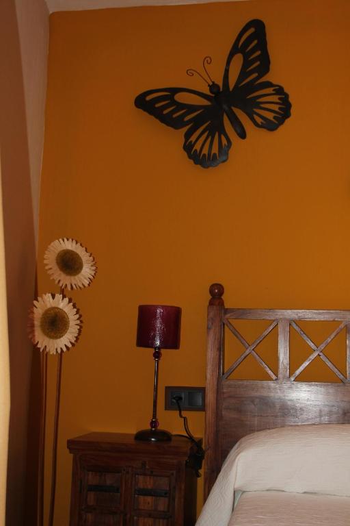 A bed or beds in a room at El Rincón Del Juez