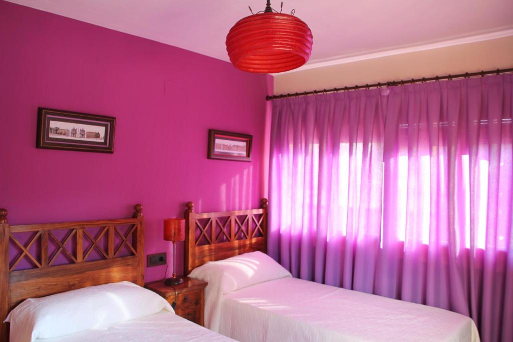 A bed or beds in a room at El Rincón Del Juez