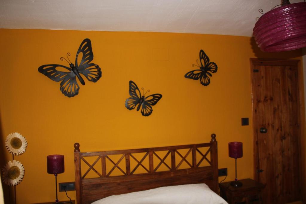 A bed or beds in a room at El Rincón Del Juez