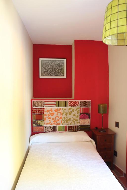 A bed or beds in a room at El Rincón Del Juez