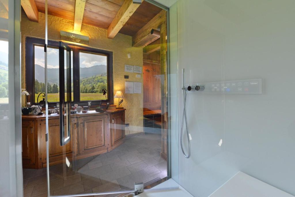 Koupelna v ubytování Hotel Le Petit Abri