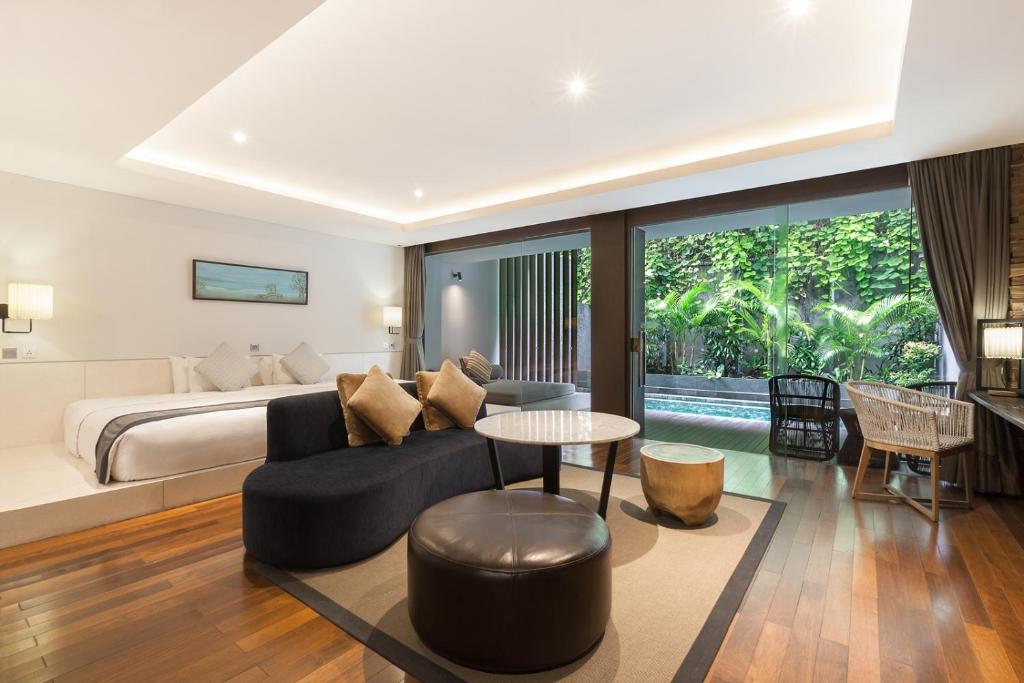 Postel nebo postele na pokoji v ubytování Watermark Hotel & Spa Bali