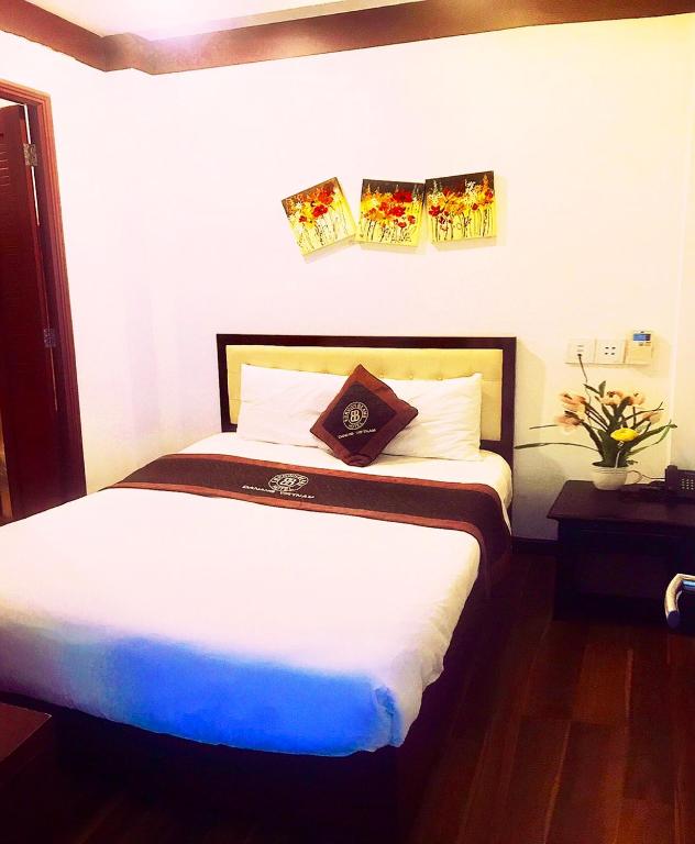 Postel nebo postele na pokoji v ubytování Brown Bean 2 Hotel