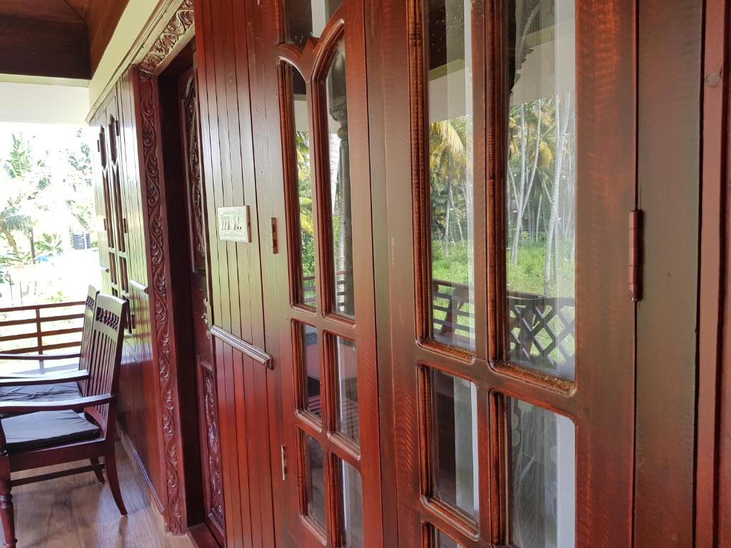 Balkón nebo terasa v ubytování Kerala cottage