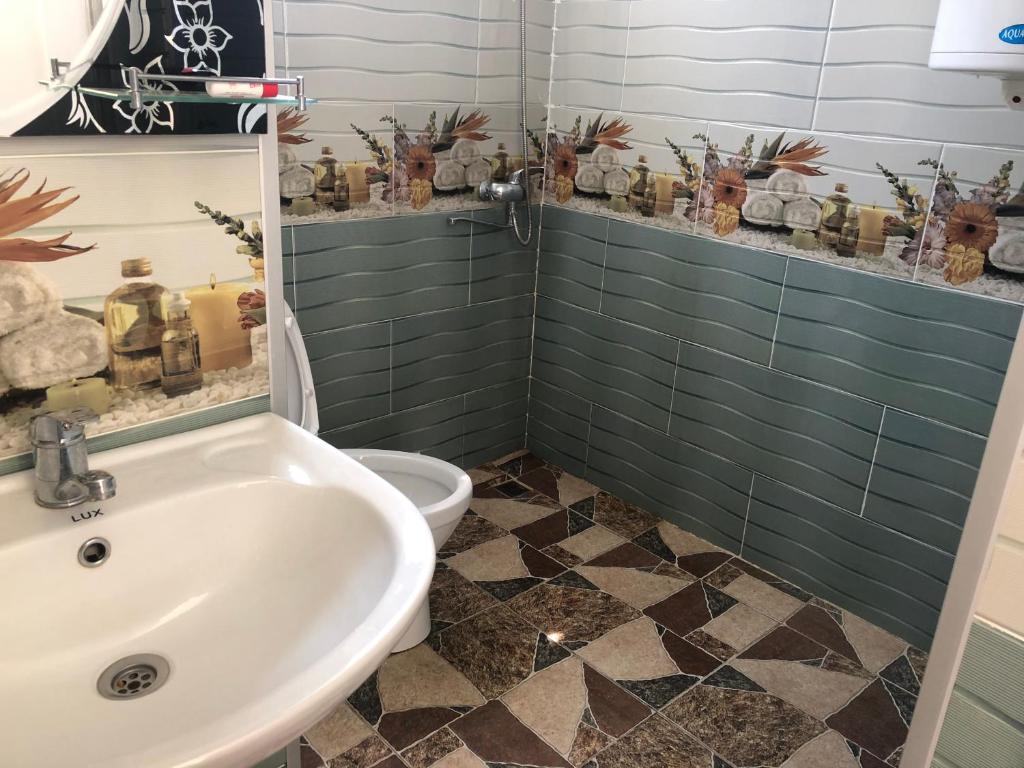 Koupelna v ubytování Guesthouse Svani