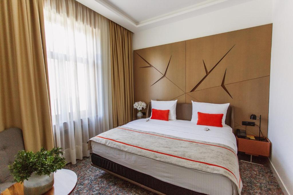 Postel nebo postele na pokoji v ubytování Hotel Austria & Bosna