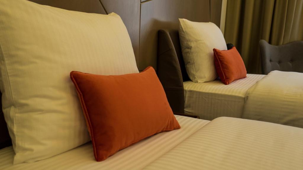 Postel nebo postele na pokoji v ubytování Hotel Austria & Bosna