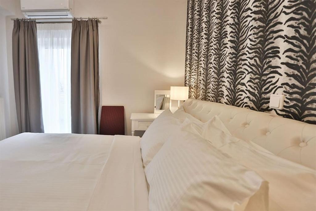Posteľ alebo postele v izbe v ubytovaní V Luxury Apartment 3