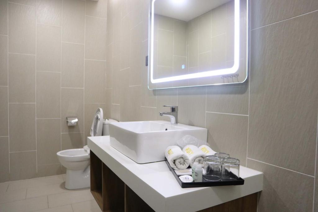 Koupelna v ubytování Roxy Hotel Padungan