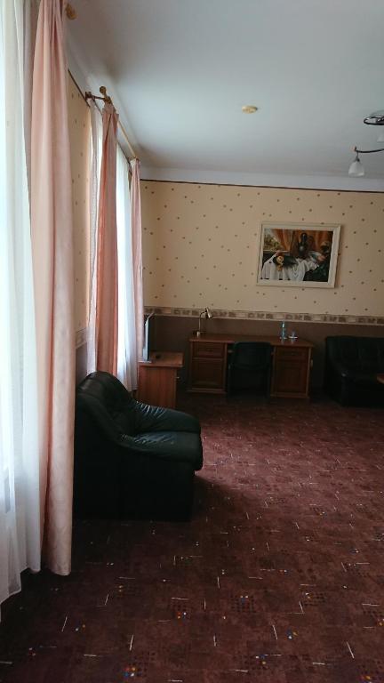 Posezení v ubytování Gamma Hotel
