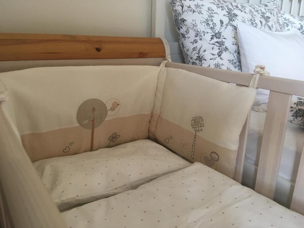 Postel nebo postele na pokoji v ubytování Apartment Hahnenkammblick