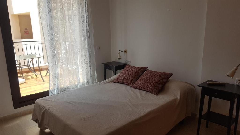 Postel nebo postele na pokoji v ubytování Urb. Los Collados .Águilas Apartamento