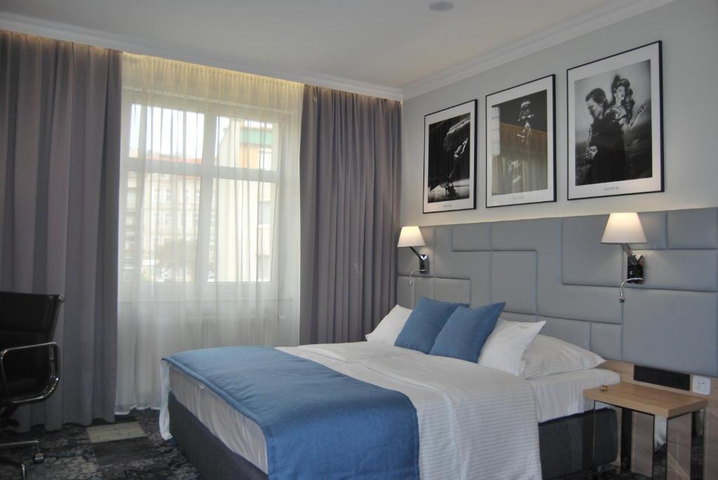Posteľ alebo postele v izbe v ubytovaní Hotel Włoski Italia Boutique Old Town Poznań