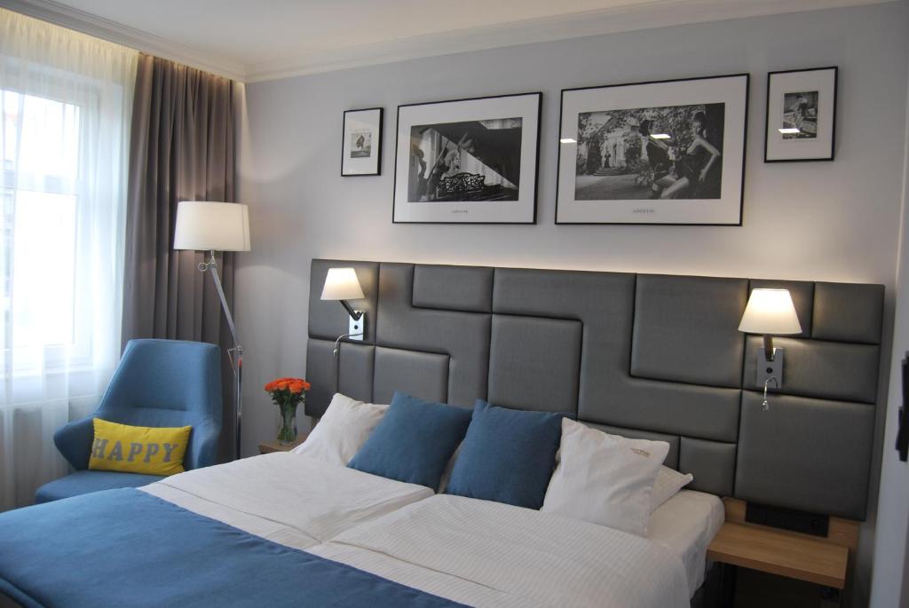 Posteľ alebo postele v izbe v ubytovaní Hotel Włoski Italia Boutique Old Town Poznań