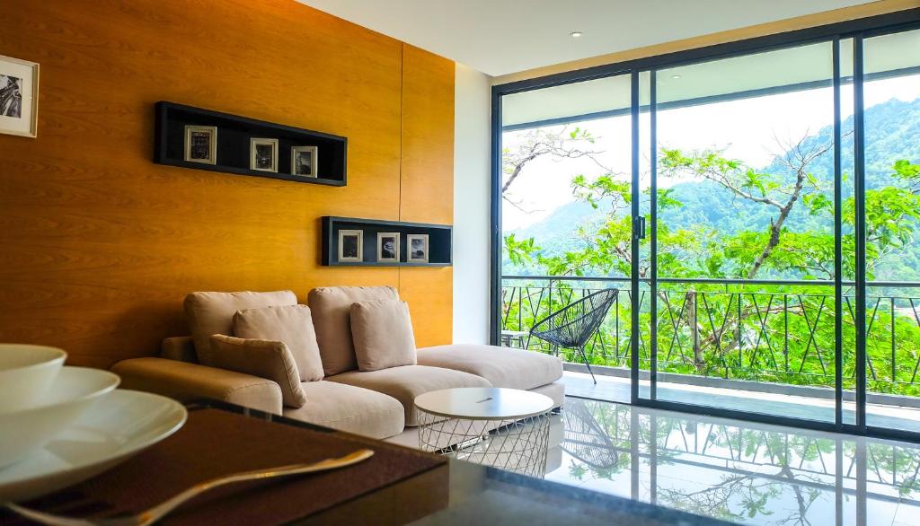 Posezení v ubytování The Woods Natural Park Resort Phuket