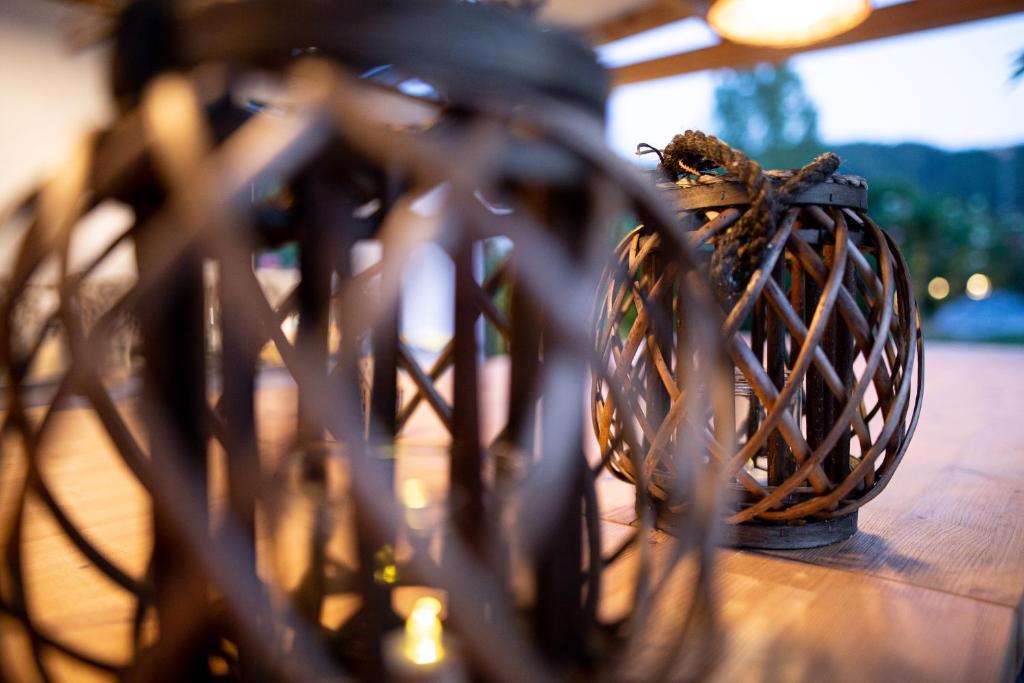 a basket sitting on top of a wooden table at Kokkinos in Vourvourou