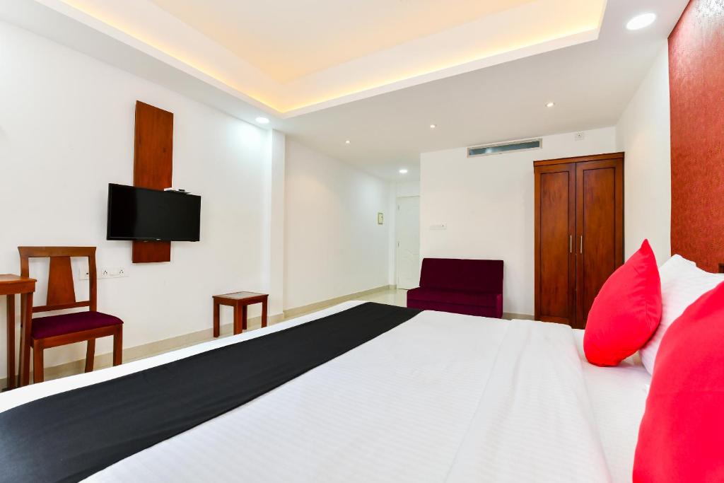 Postel nebo postele na pokoji v ubytování Hotel Hilite Inn