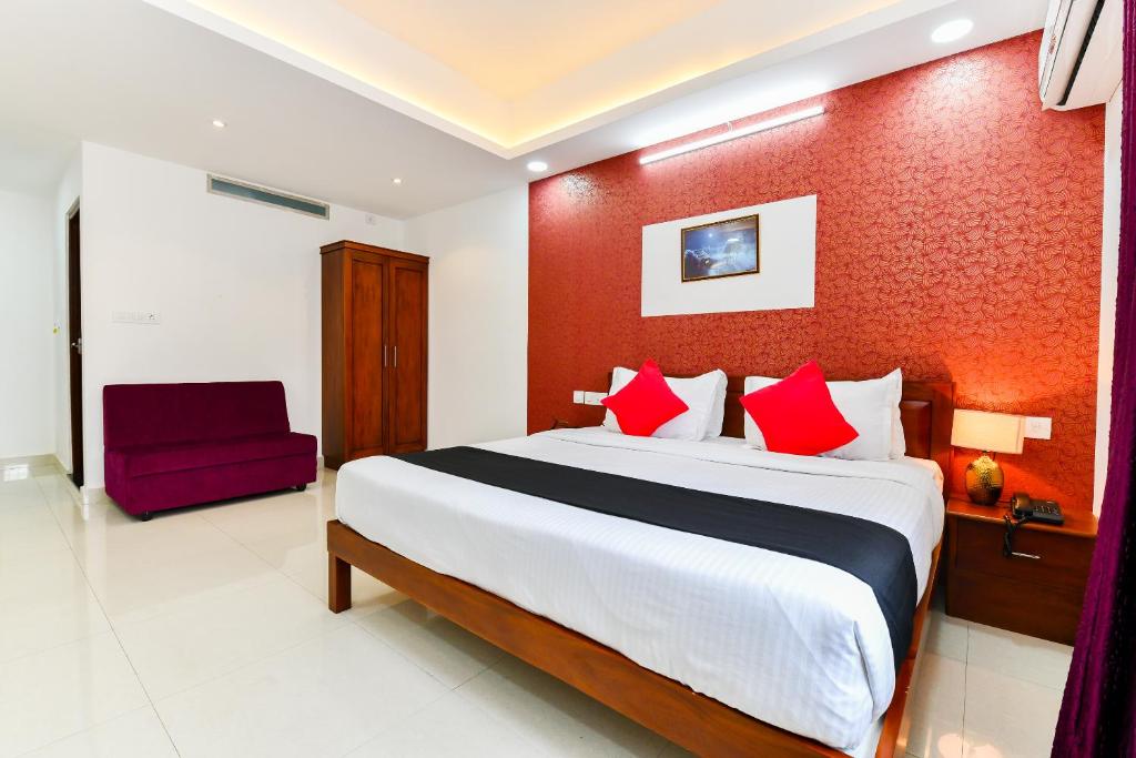 Postel nebo postele na pokoji v ubytování Hotel Hilite Inn