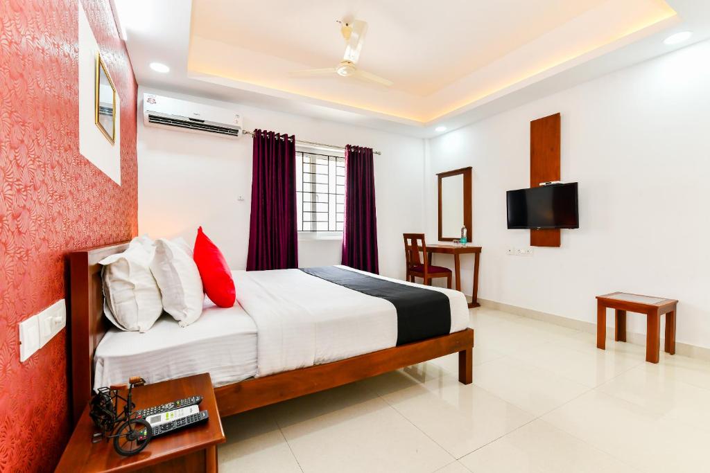 Postel nebo postele na pokoji v ubytování Hotel Hilite Inn
