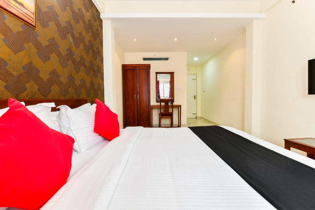 Postel nebo postele na pokoji v ubytování Hotel Hilite Inn