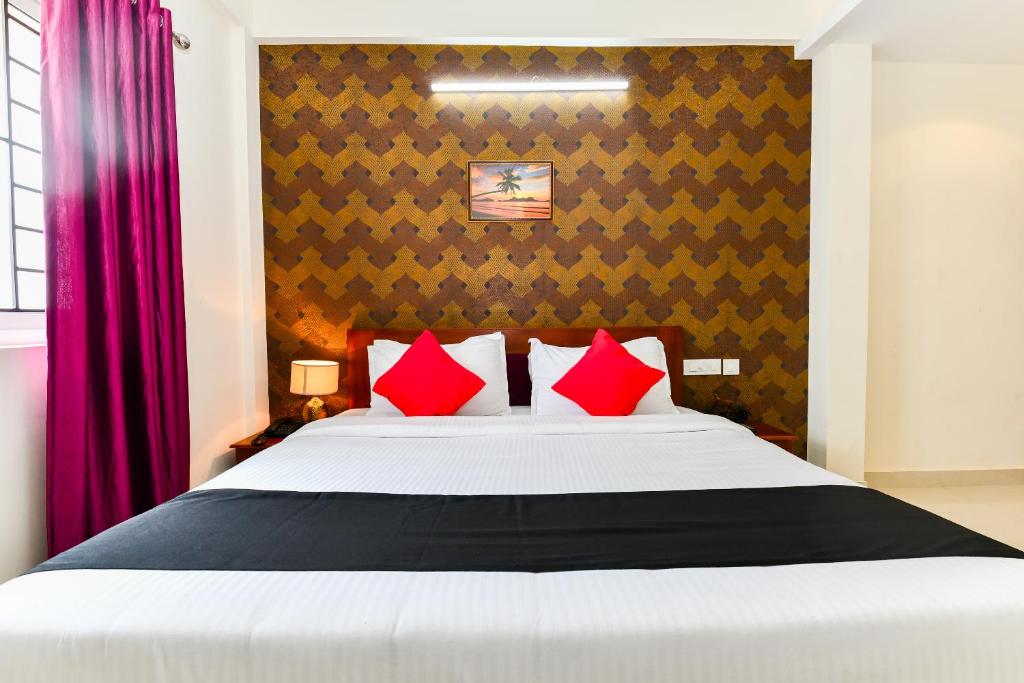Postel nebo postele na pokoji v ubytování Hotel Hilite Inn