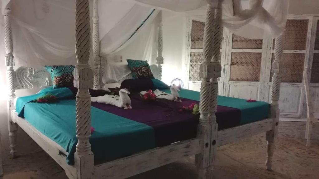 Postel nebo postele na pokoji v ubytování Aquarius Club