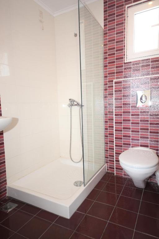 A bathroom at Cosmos Apartments
