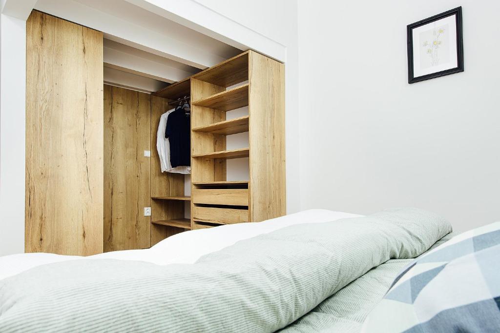 Postel nebo postele na pokoji v ubytování Loft v historickom centre