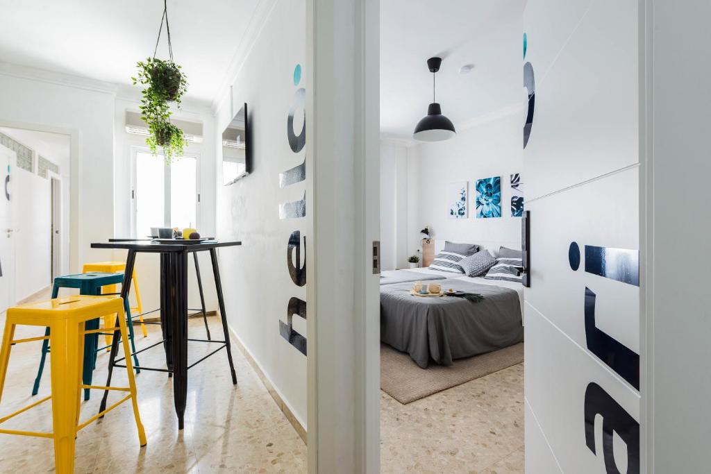 Postel nebo postele na pokoji v ubytování Nordik Rooms Urban - Trinidad "Copenhague"