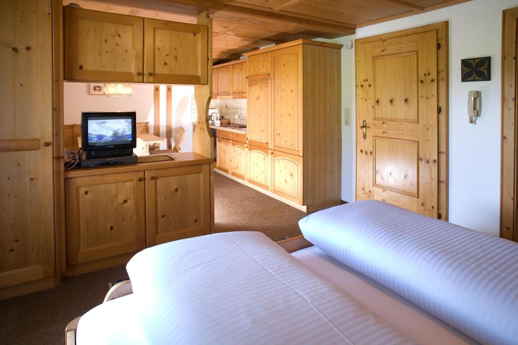 Postel nebo postele na pokoji v ubytování Gästehaus Rauch