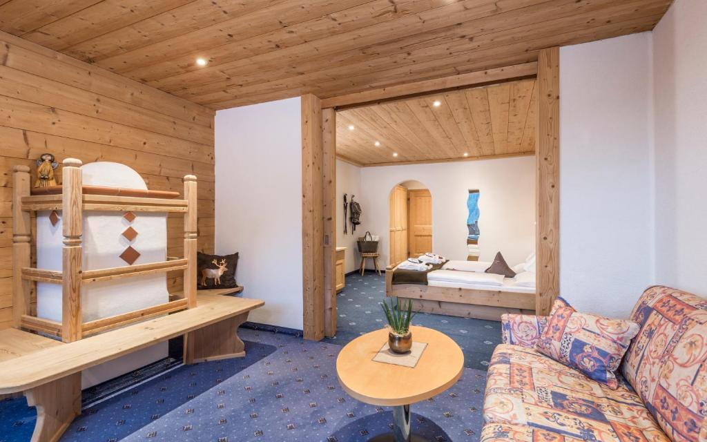 Postel nebo postele na pokoji v ubytování Panorama Resort Taljörgele