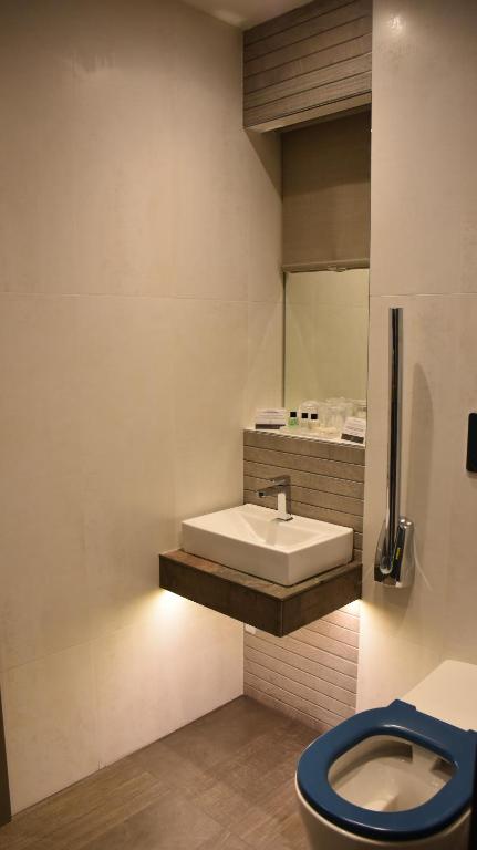 Koupelna v ubytování Carlton Hotel