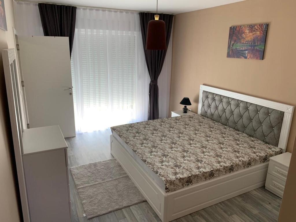 Postel nebo postele na pokoji v ubytování Apartments Divoli
