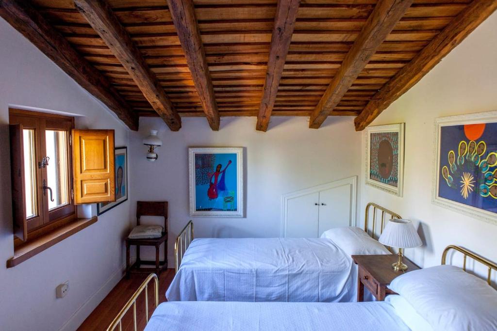 Postel nebo postele na pokoji v ubytování Charming Boutique Country House: La Casa Vieja (Sotosalbos)