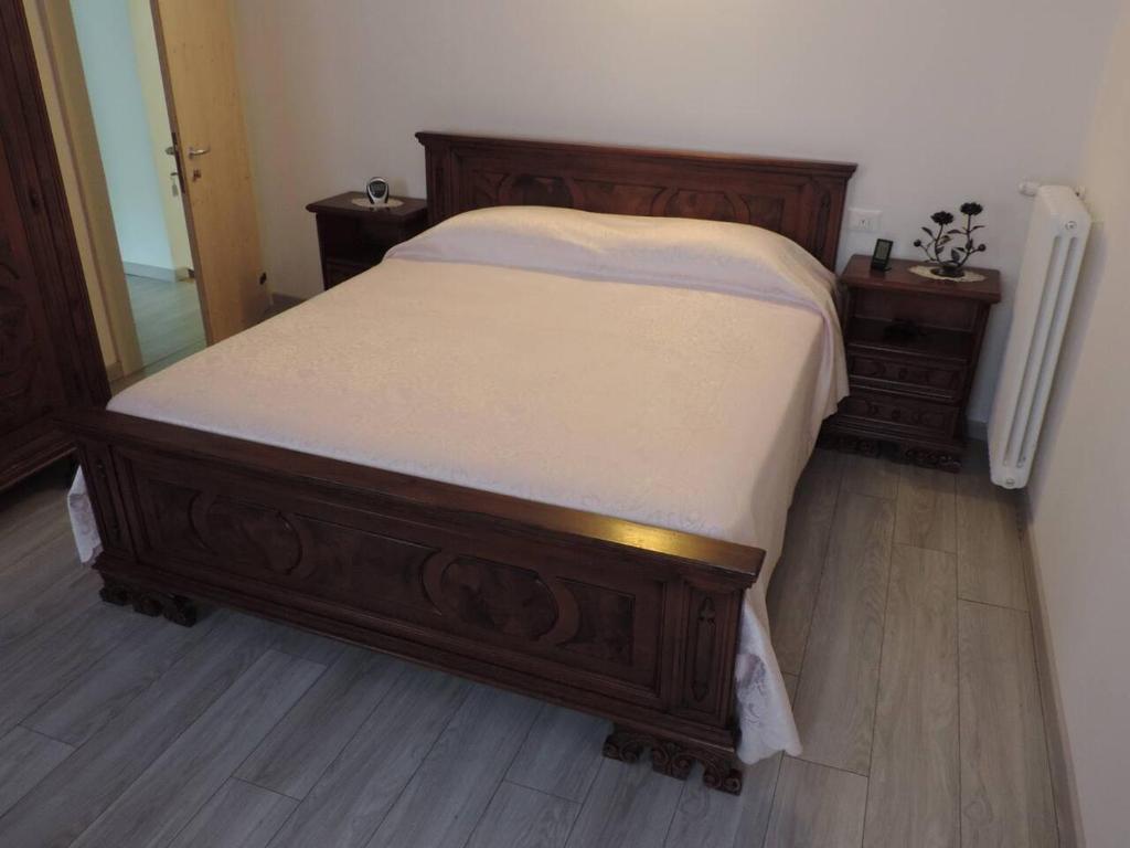 A bed or beds in a room at Casa Rossa