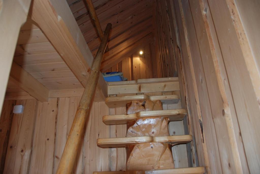 a inside of a cabin with a wooden ceiling at Pokoje u Danusi in Czarna Góra
