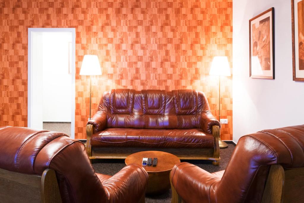 Posezení v ubytování VILLA CENTRUM APARTMÁNY s RAŇAJKAMI A SAUNOU