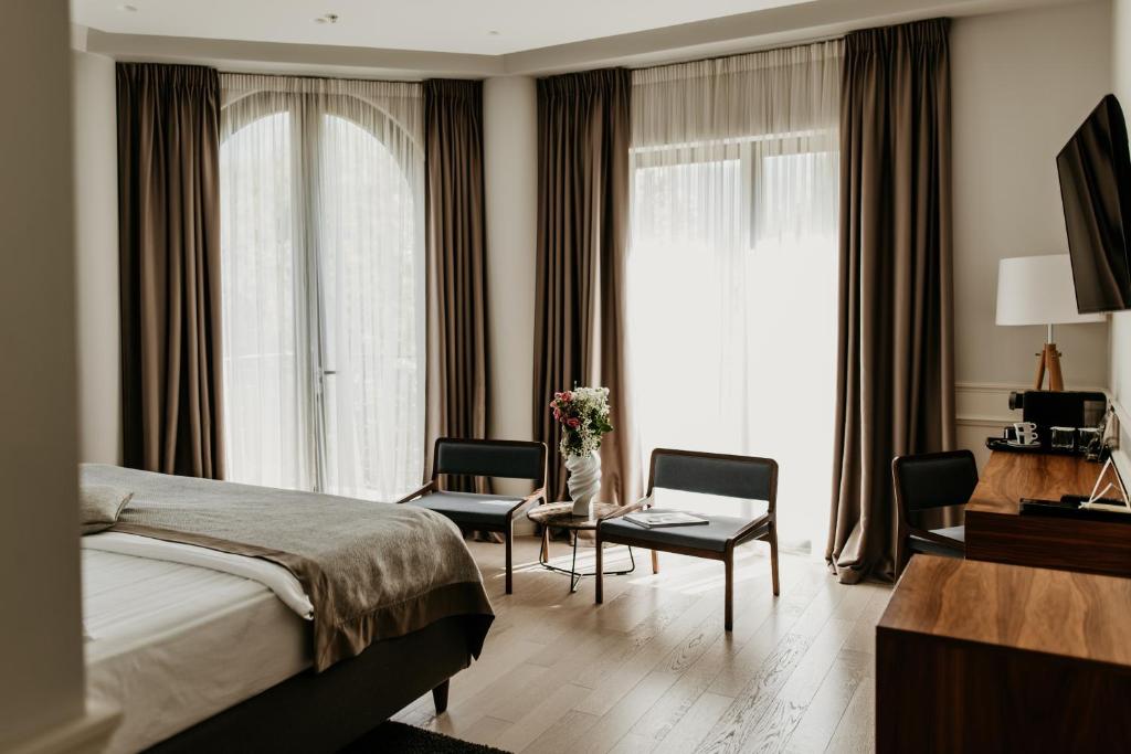 Posteľ alebo postele v izbe v ubytovaní Hotel Majestic