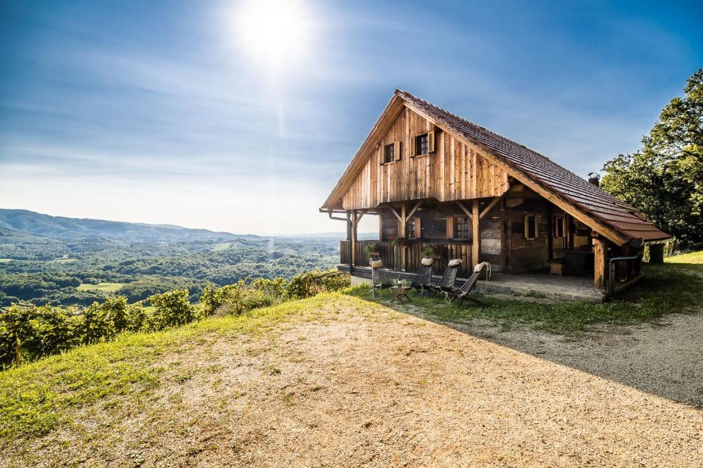 a house on top of a hill with a view at Sleme house in Krška Vas