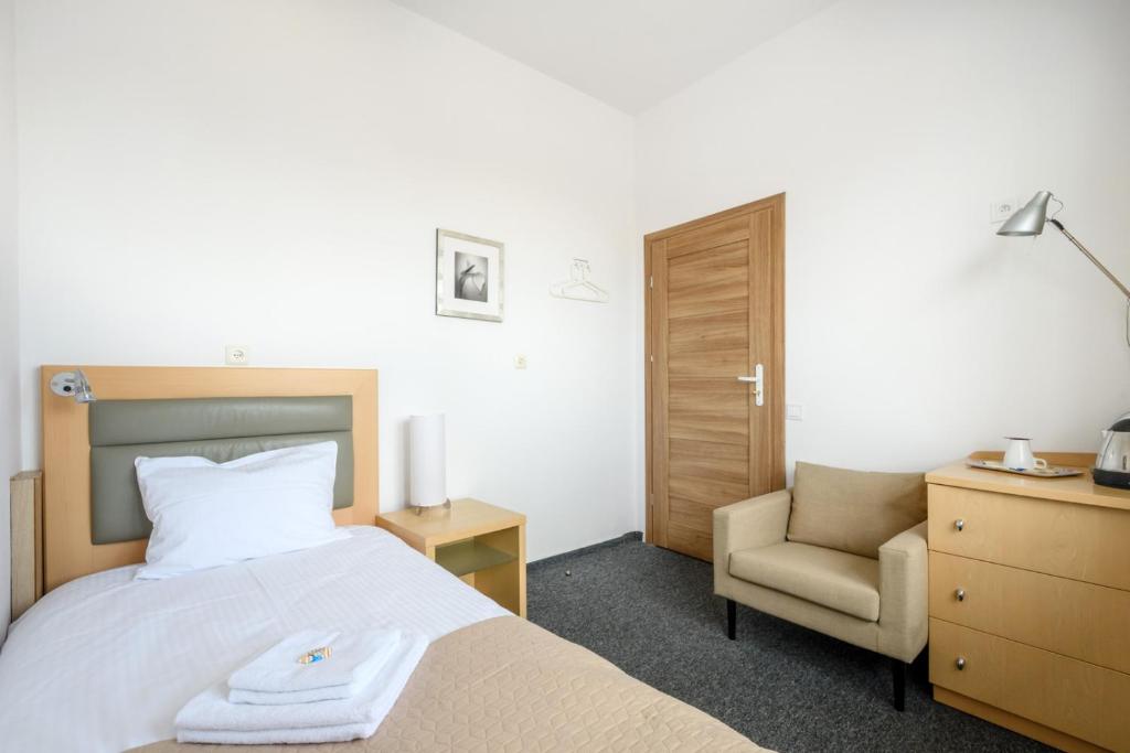 Posteľ alebo postele v izbe v ubytovaní 404 Rooms Wilanowska