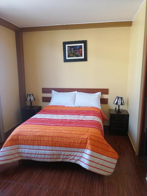 Postel nebo postele na pokoji v ubytování Nasca Travel One Hostel