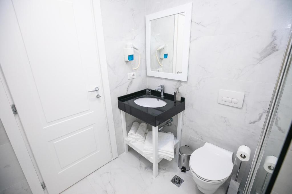 Koupelna v ubytování Hotel Elior