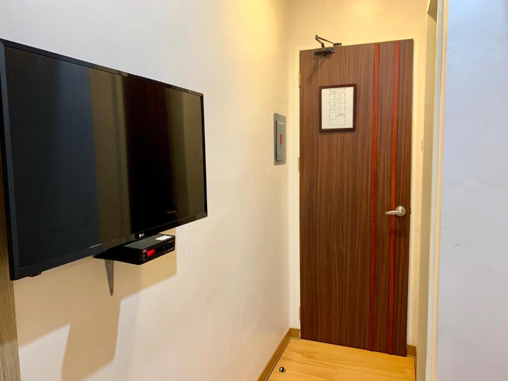 TV a/nebo společenská místnost v ubytování Davao Persimmon Suites