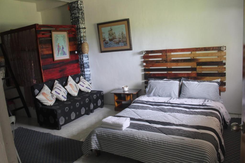 Postel nebo postele na pokoji v ubytování Maraño's Home