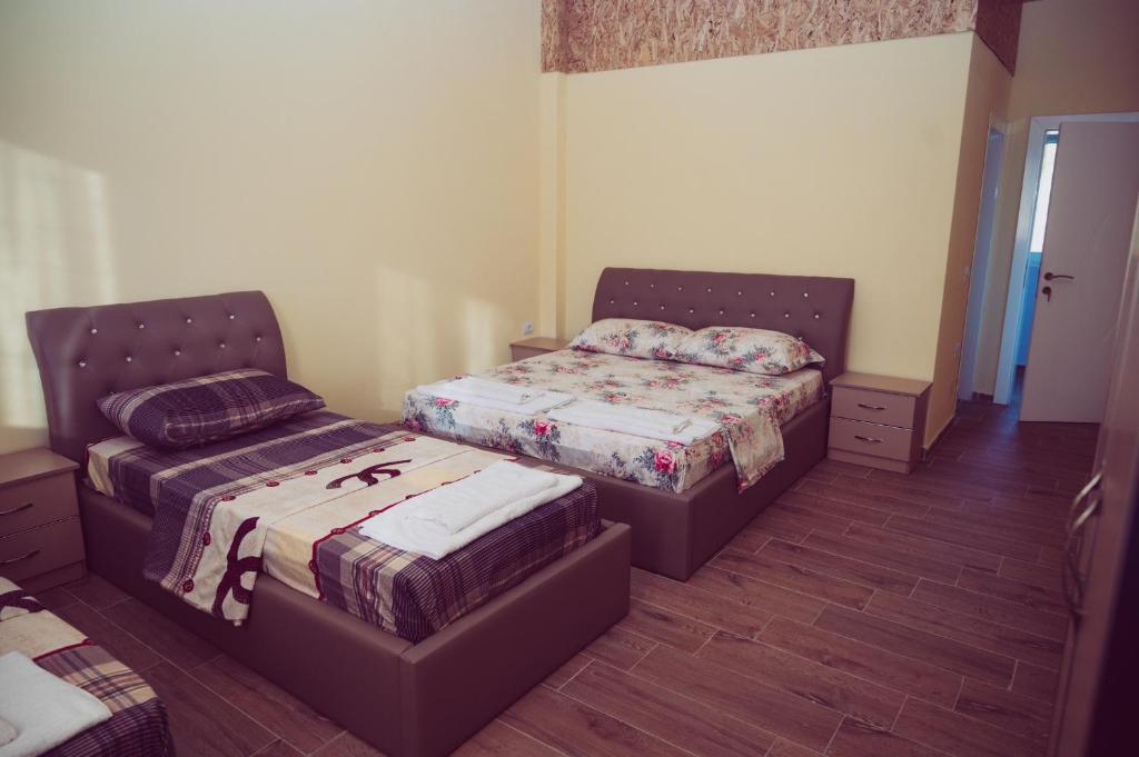 Postel nebo postele na pokoji v ubytování Joni Restaurant