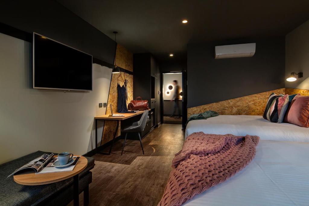 TV a/nebo společenská místnost v ubytování Marion Hotel