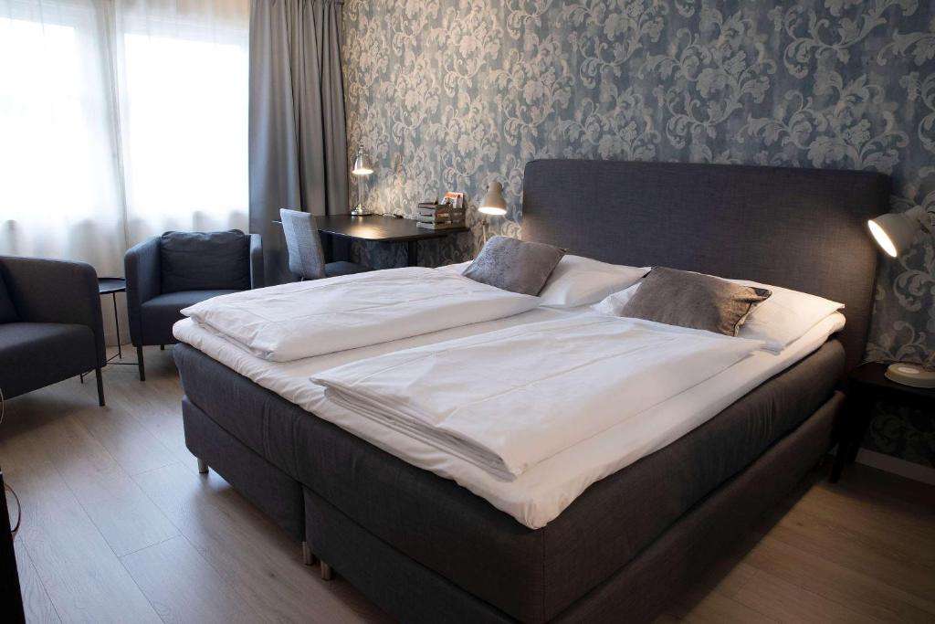 Postel nebo postele na pokoji v ubytování Best Western Tingvold Park Hotel