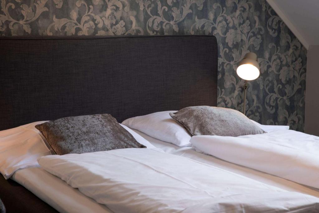 Postel nebo postele na pokoji v ubytování Best Western Tingvold Park Hotel